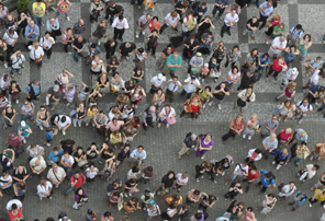 Crowd of people looking up (iStock)